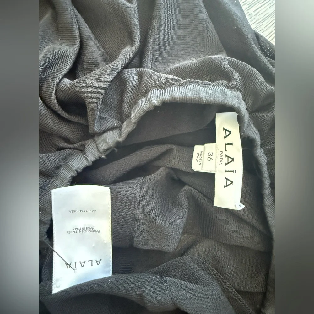 $3375 Alaia sheer peplum black balloon pants